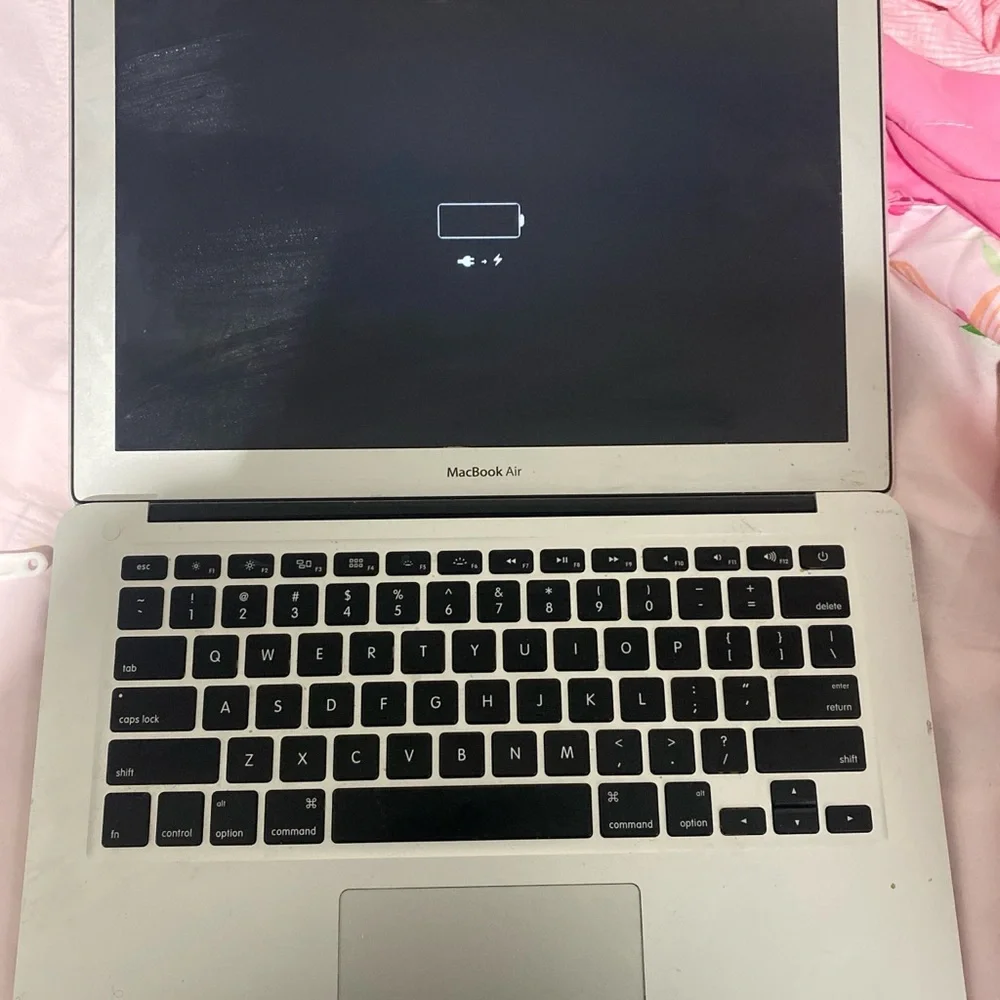 Apple Silver MacBook with Sleek Design and Iconic Logo